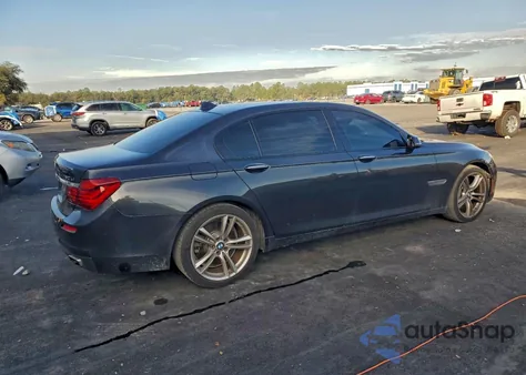 2015 BMW 750 Li z USA, uszkodzony, nr VIN WBAYE8C58FD782282